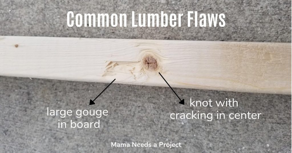common lumber flaws, example of a board with a large gouge and a knot that is dry and cracking