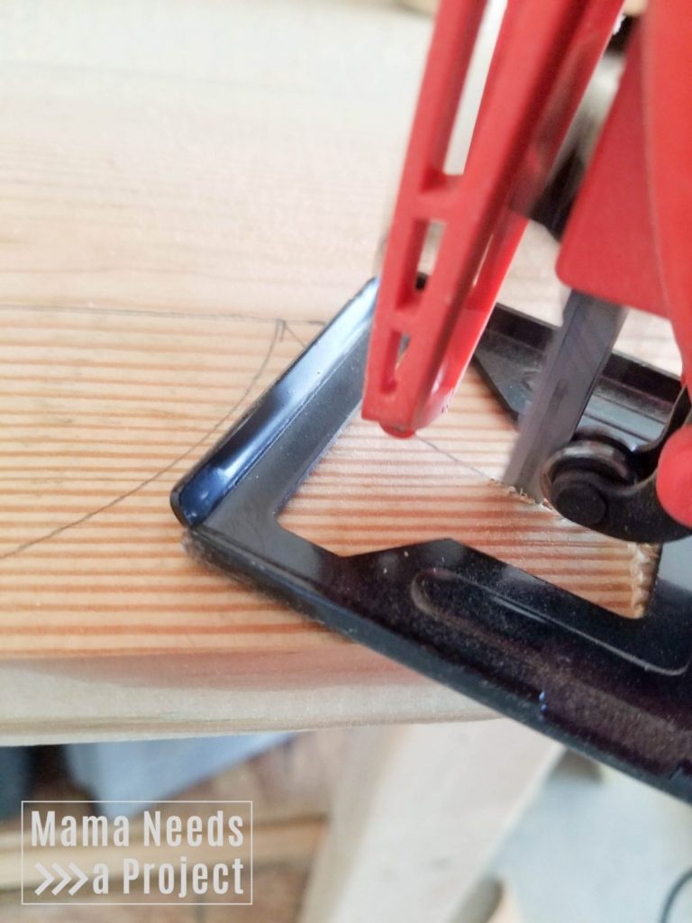 cutting out a shape with a jigsaw, close up of blade