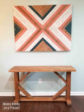 skinny console table and big x wood wall quilt