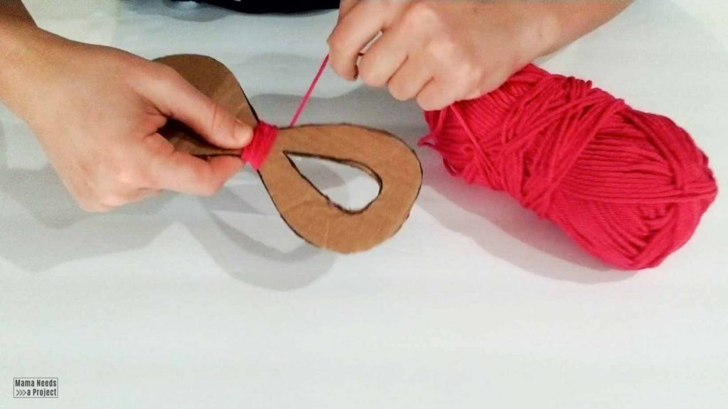 wrap yarn around cardboard bow template