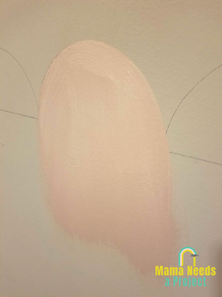 painting a scalloped wall close up