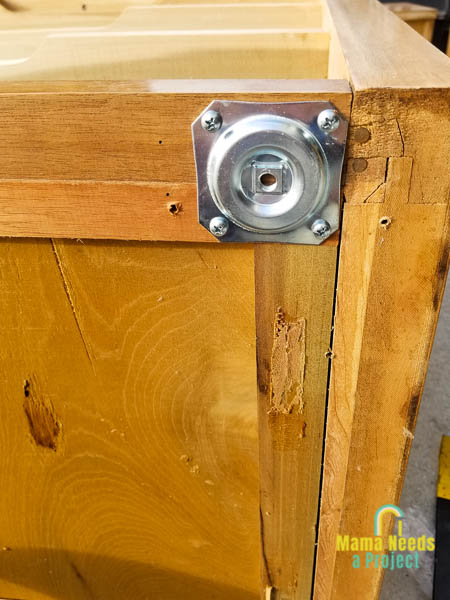 add leg mounting plate to bottom of dresser to attach legs