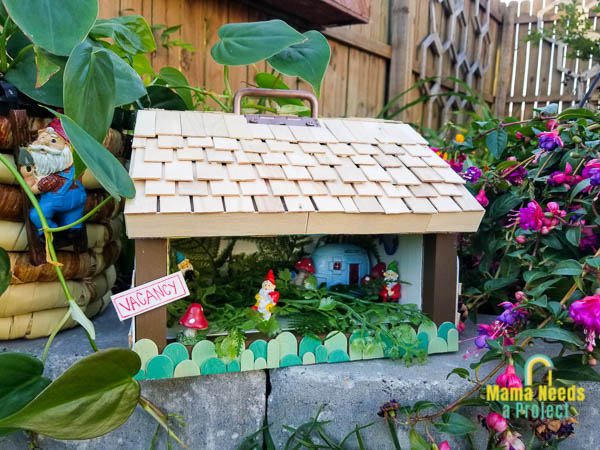 diy bug bungalow decorated with popsicle sticks