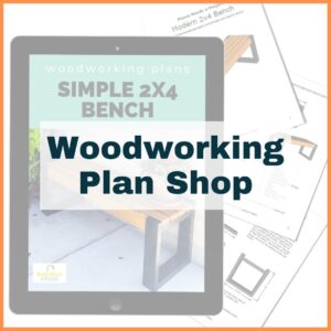 woodworking plan shop text over image of pdf woodworking plans on a tablet and paper